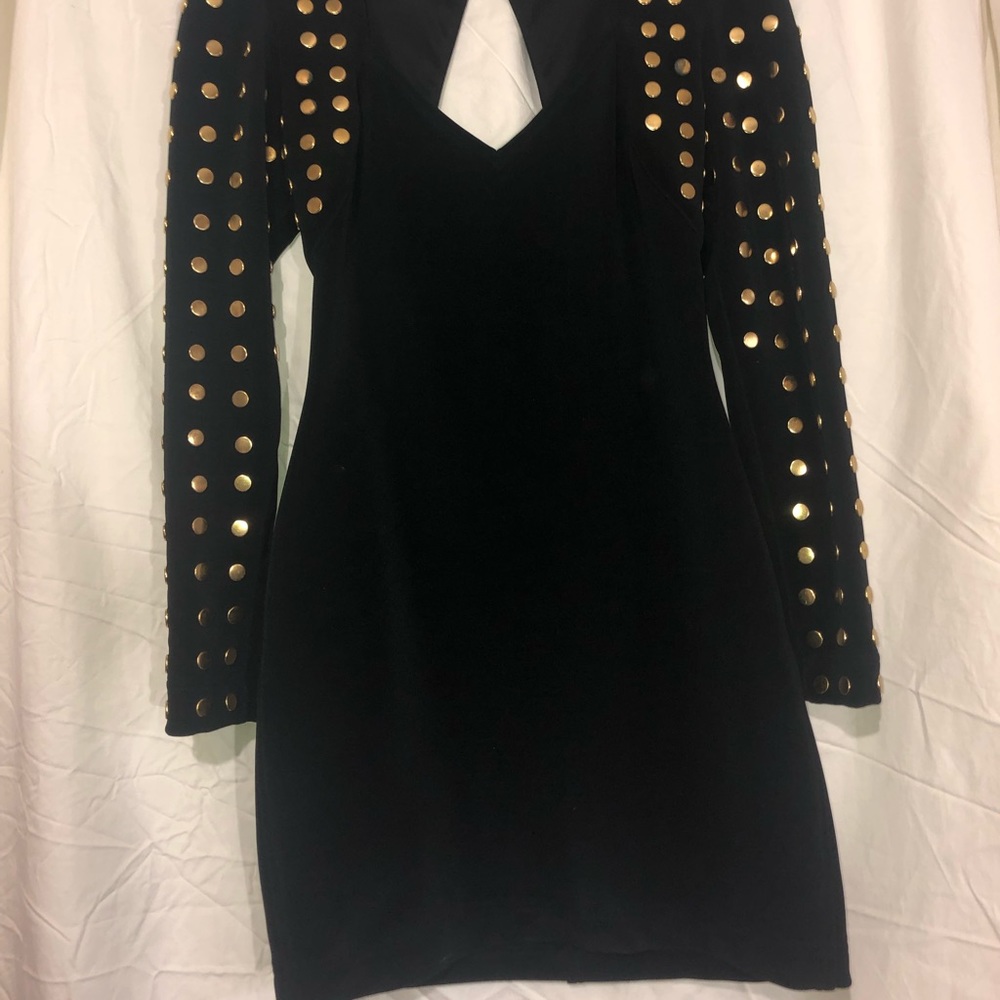 Black short dress with gold dots on the sleeves